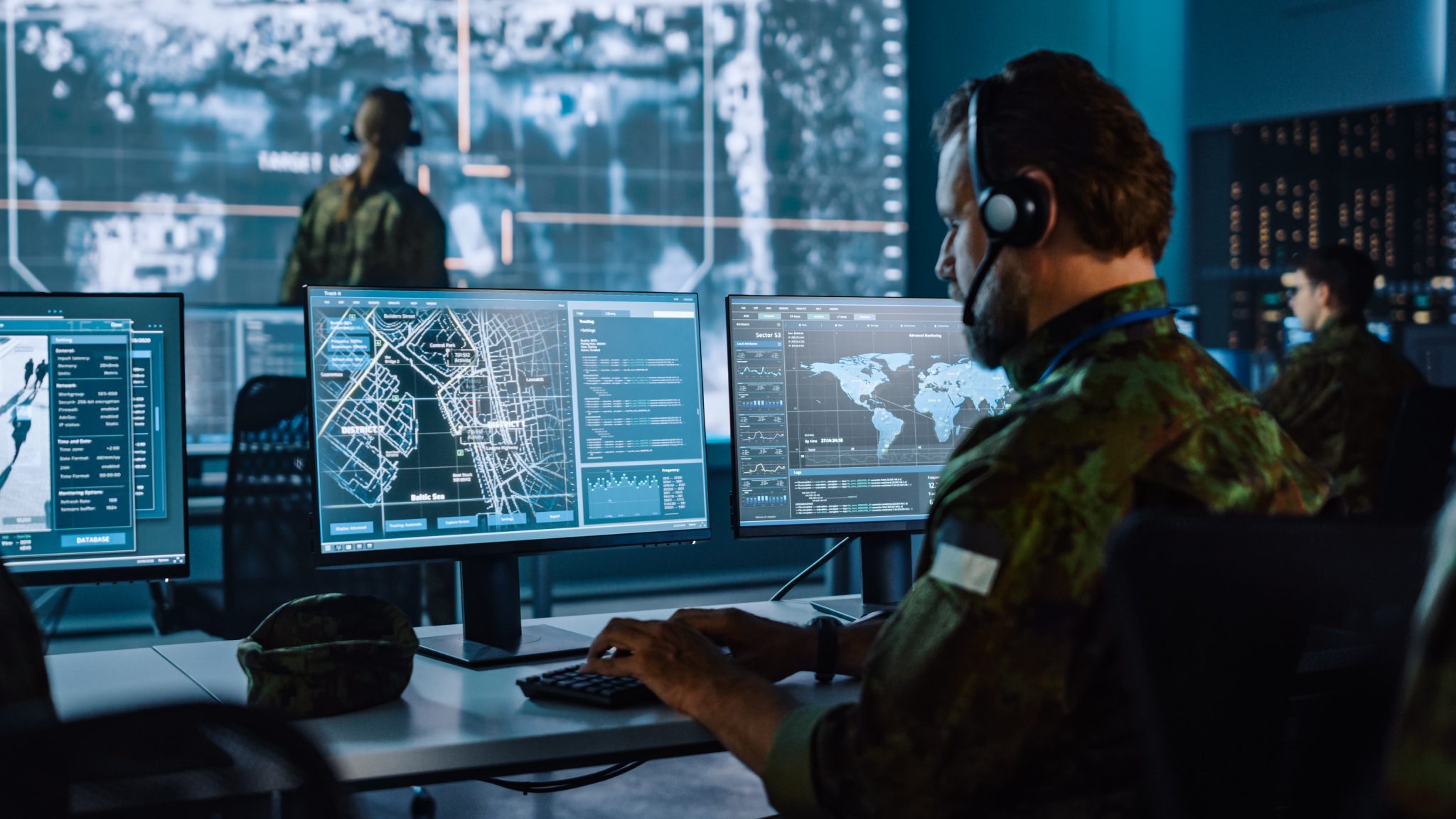male operator in military control room